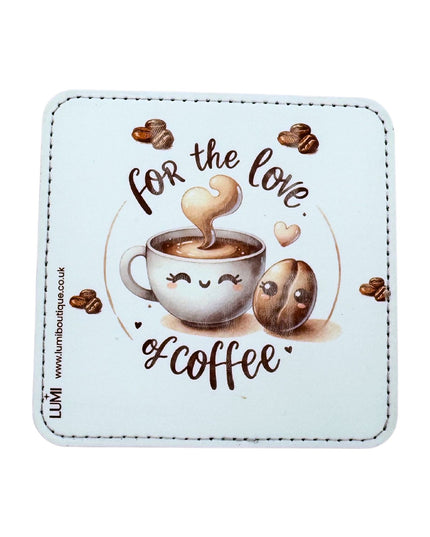 Coaster with a design of a coffee cup and beans, text 'For the love of coffee', on a light blue background.